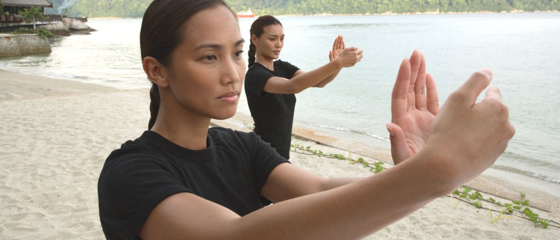 yoga at the spa villa deck pangkor laut malaysia